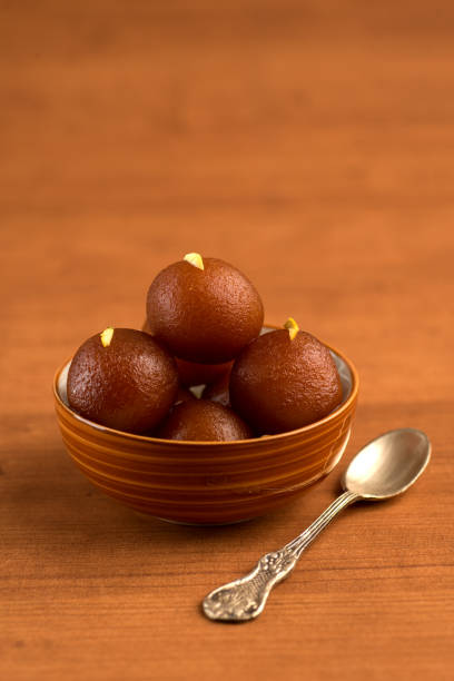 End on a sweet note with classic Indian treats—from creamy kulfi to warm, syrupy gulab jamun.